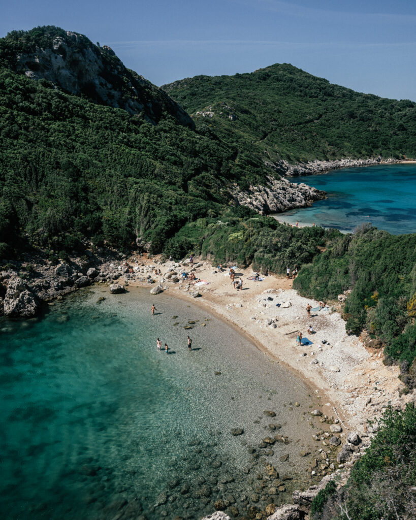 A complete travel guide to Corfu, Greece including the best beaches, cliff jumping, viewpoints, hotels, restaurants, beach bars, Google Map pins and more.