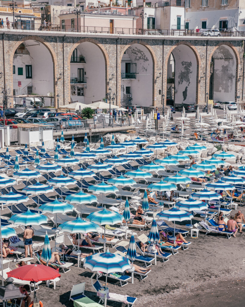 A complete travel guide to planning a trip to the Amalfi Coast including the best beaches, beach clubs, town, hotels,. restaurants and more.