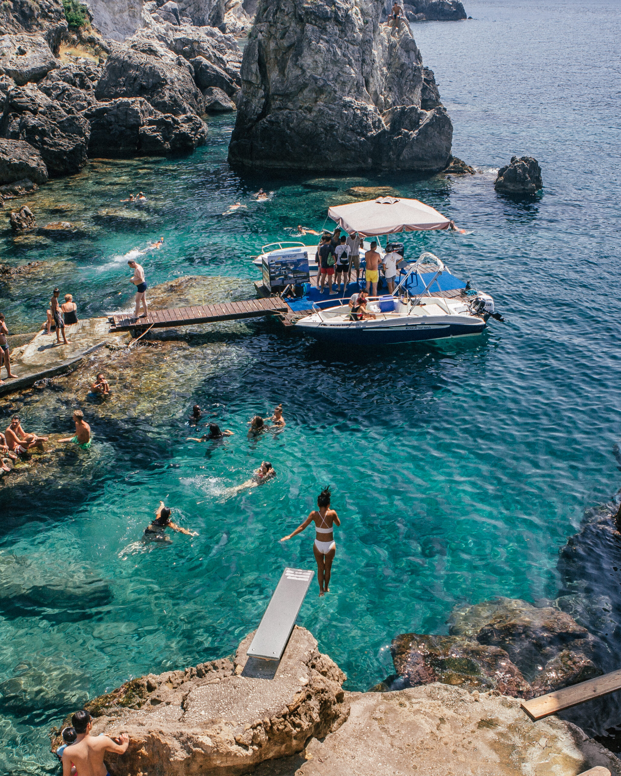 A complete travel guide to Corfu including the best beaches, cliff jumping, viewpoints, hotels, restaurants and more.