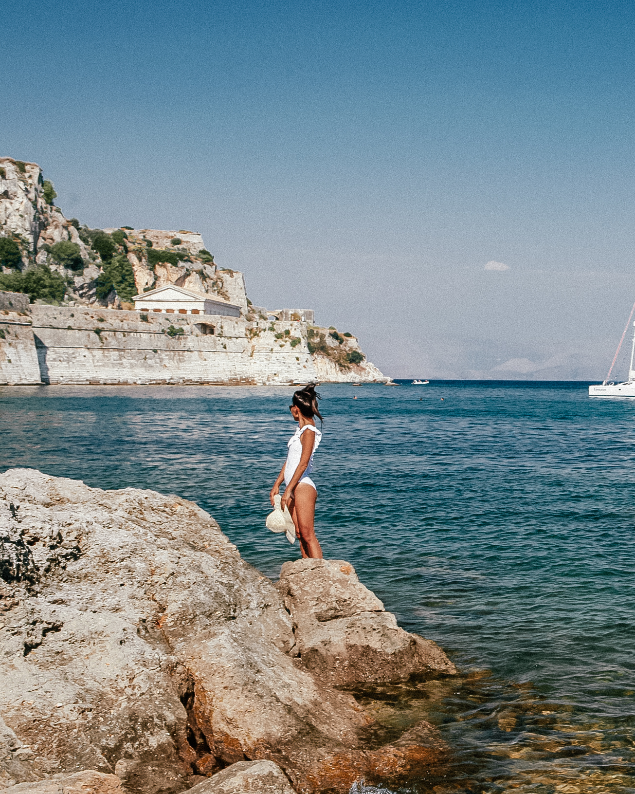 A complete travel guide to Corfu including the best beaches, cliff jumping, viewpoints, hotels, restaurants and more.
