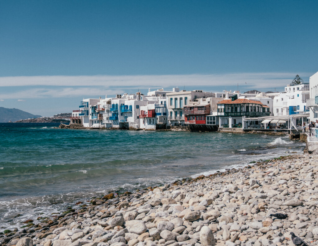 A first-timer's guide to Mykonos, Greece including the best beaches, sunset bars, photo locations, Google map pins, hotels, restaurants and more.