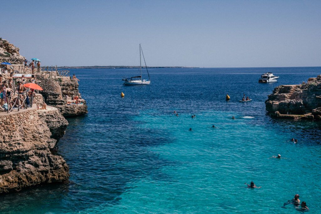 A complete guide to the island of Menorca in Spain including the best beaches, calas, towns, hotels, restaurants, cliff bars and more.