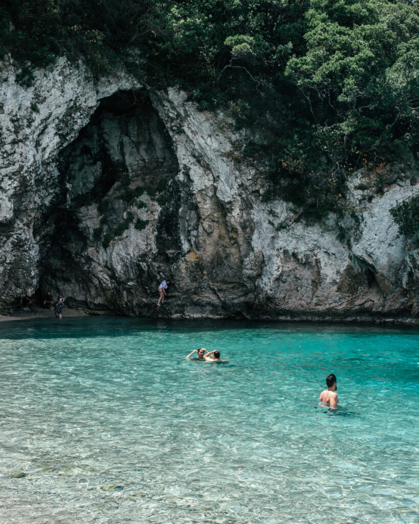 A complete travel guide to Corfu, Greece including the best beaches, cliff jumping, viewpoints, hotels, restaurants, beach bars, Google Map pins and more.