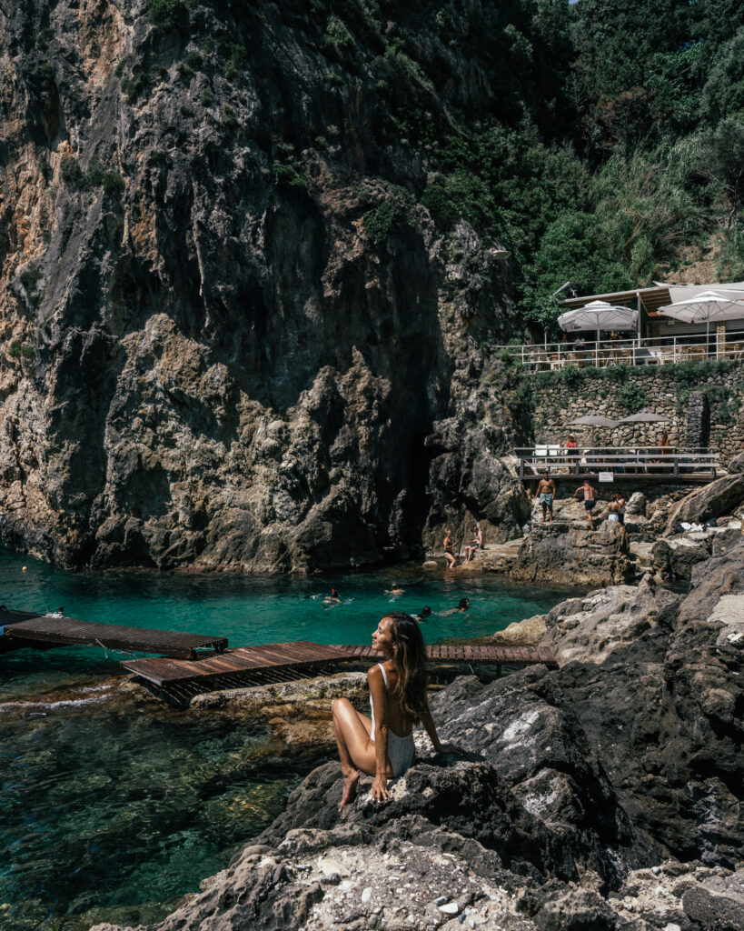 A complete travel guide to Corfu, Greece including the best beaches, cliff jumping, viewpoints, hotels, restaurants, beach bars, Google Map pins and more.