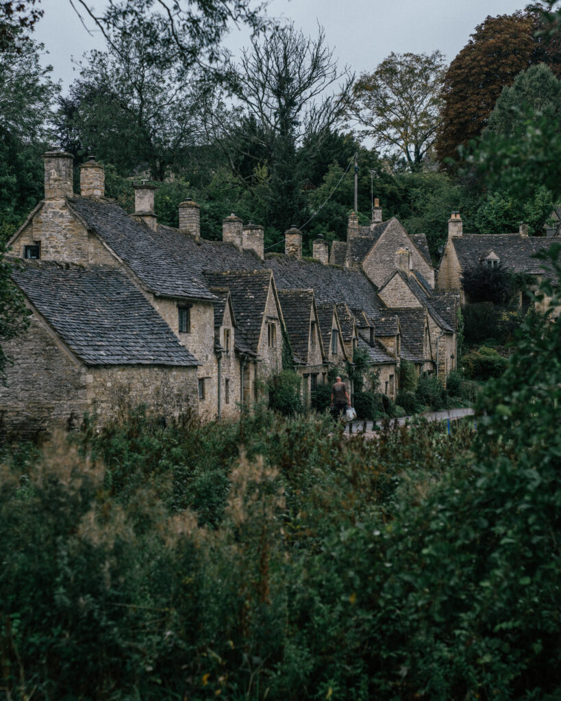A travel guide to Bibury in The Cotswolds including the best places to visit, hotels, bakeries, Bibury photo locations, travel tips and more.